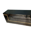 A 1970s vintage black piano lacquer sideboard by Jean Claude Mahey for Roche Bobois with brass detail