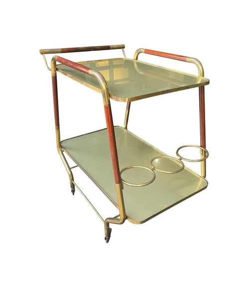 Vintage drinks trolley by Cesare Lacca, gold and lacquered wood with gold painted glass shelves, brass bottle holder and original brass castors. Italian Circa 1950s 