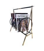 An unusual Italian 1950s mid century brass and black lacquered spiral magazine rack