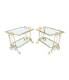 A pair of 1950s gilt wrought iron French side tables, with glass shelves