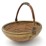 An Italian 1970s woven bamboo and brass bowl in the style of Gabriella Crespi