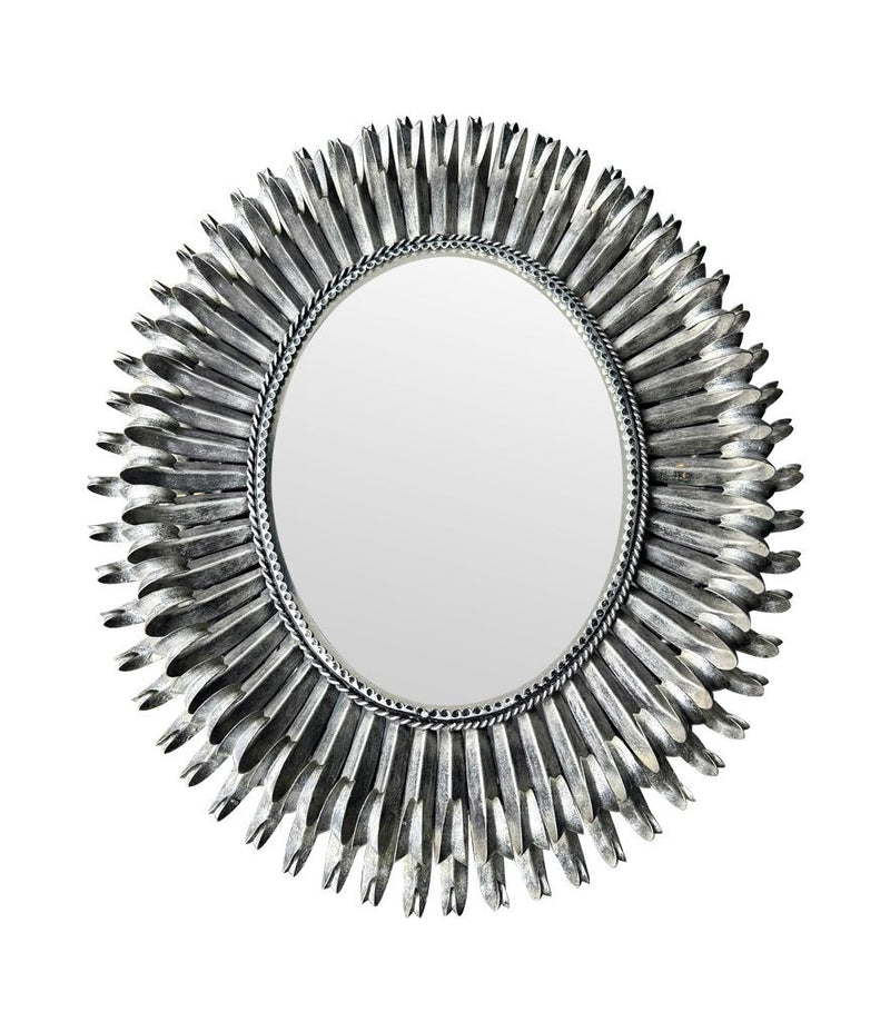 A Spanish 1960s silvered metal landscape or portrait oval eyelash mirror