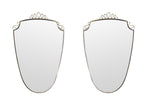 An orignal pair of 1950s Gio Ponti style Italian portrait brass framed mirror with brass top scroll detailing