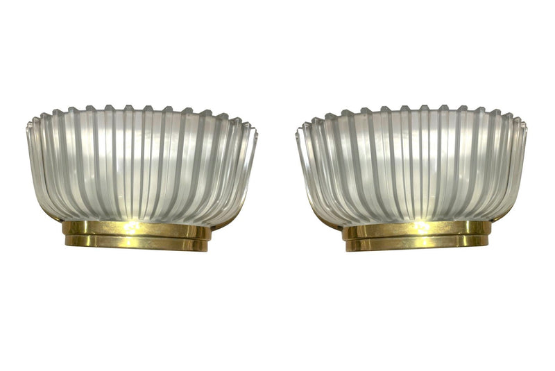 A lovely pair of 1940s Art Deco opaque Murano glass ribbed wall sconces by Seguso with brass wall mounts