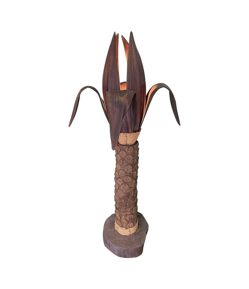 An unusual palm tree floor lamp with real palm trunk wooden base and wooden shaped leaves