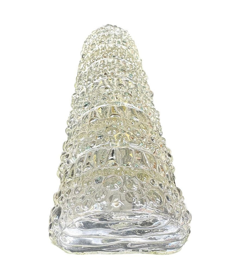 A pair of 1960s clear geometric textured glass wall lights