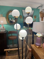 An orignal 1950s Stilnovo "Arberello" black lacquer and brass six light floor lamp