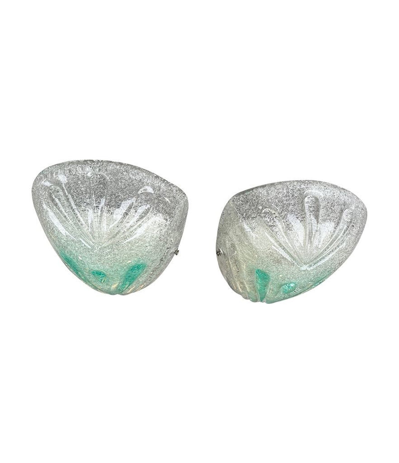 A pair of 1970s Italian Murano glass wall sconces with teal green centre detail