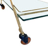 A 1980s Gallotti and Radice “Mister” bar trolley with brass frame and cherry wood handles.