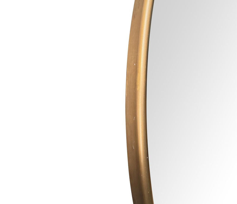 A large orignal Italian 1960s oval brass framed mirror