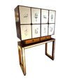 An Italian 1940s mirrored birdseye maple wood and mahogany bar cabinet by Osvaldo Borsani