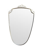 An orignal pair of 1950s Gio Ponti style Italian portrait brass framed mirror with brass top scroll detailing