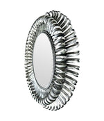 A Spanish 1960s silvered metal landscape or portrait oval eyelash mirror