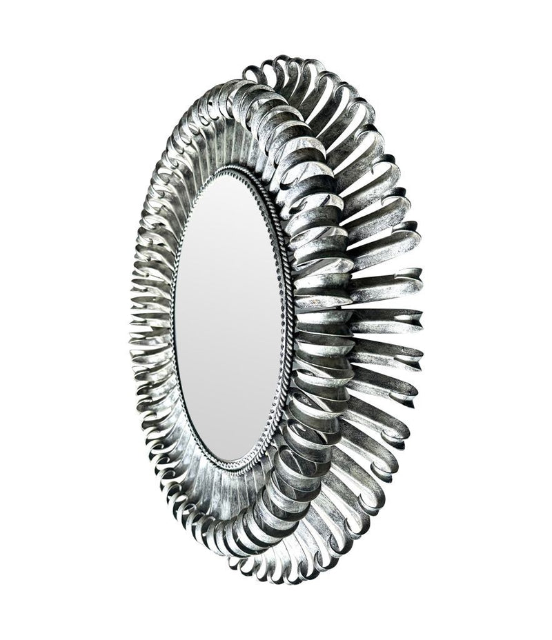 A Spanish 1960s silvered metal landscape or portrait oval eyelash mirror