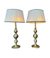 A pair of large Italian 1970s solid brass lamps with orignal satin shades