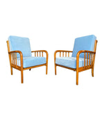 A pair of 1950s Italian armchairs attributed to Paolo Buffa, newly upholstered in Designers Guild velvet