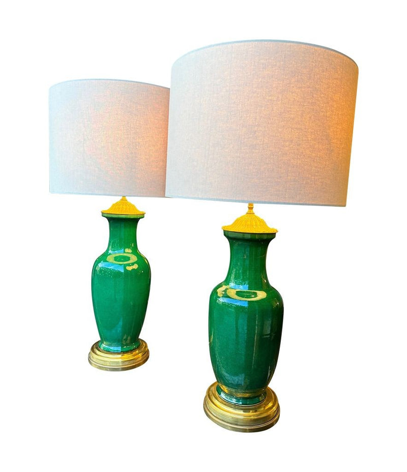 A lovely large pair of 1950s Italian crackle glaze green vase lamps with solid brass bases