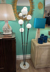 An orignal 1950s Stilnovo "Arberello" black lacquer and brass six light floor lamp