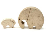 A pair of Italian 1970s carved travertine elephants by Fratelli Mannelli