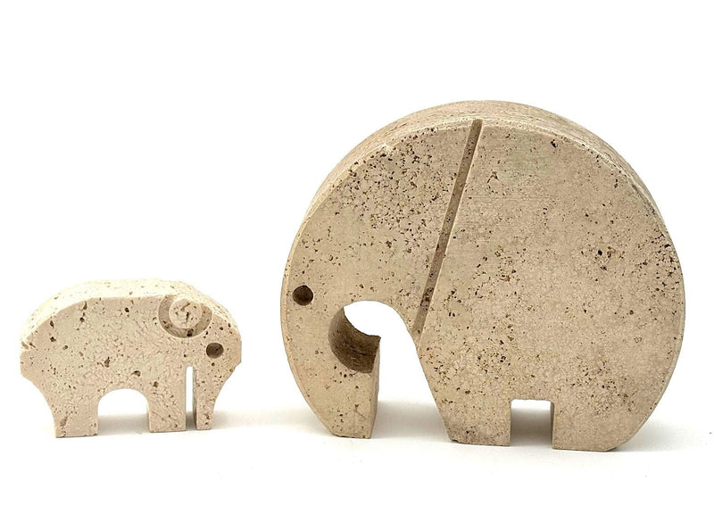 A pair of Italian 1970s carved travertine elephants by Fratelli Mannelli