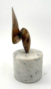 An Italian midcentury abstract 1960s bronze sculpture mounted on a circular Carrara marble base.