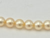 A lovely late 1980s Mappin and Webb Akoya pearl necklace with 18carat gold clasp in orignal box