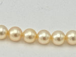 A lovely late 1980s Mappin and Webb Akoya pearl necklace with 18carat gold clasp in orignal box