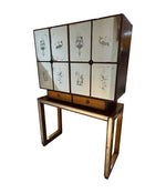 An Italian 1940s mirrored birdseye maple wood and mahogany bar cabinet by Osvaldo Borsani