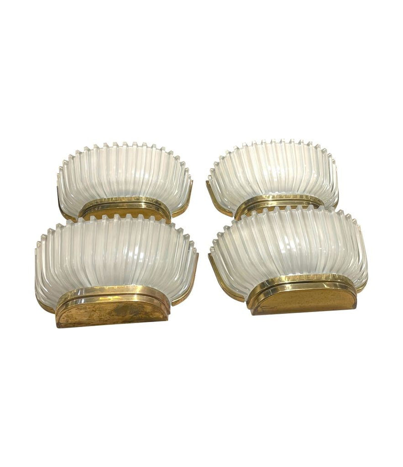 A lovely pair of 1940s Art Deco opaque Murano glass ribbed wall sconces by Seguso with brass wall mounts