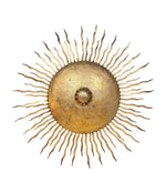 A pair of large 1950s Spanish sunburst wrought iron wall sconces