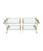 A pair of 1950s gilt wrought iron French side tables, with glass shelves