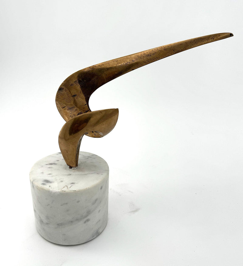 An Italian midcentury abstract 1960s bronze sculpture mounted on a circular Carrara marble base.