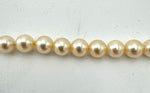 A lovely late 1980s Mappin and Webb Akoya pearl necklace with 18carat gold clasp in orignal box