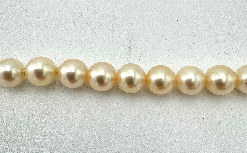 A lovely late 1980s Mappin and Webb Akoya pearl necklace with 18carat gold clasp in orignal box