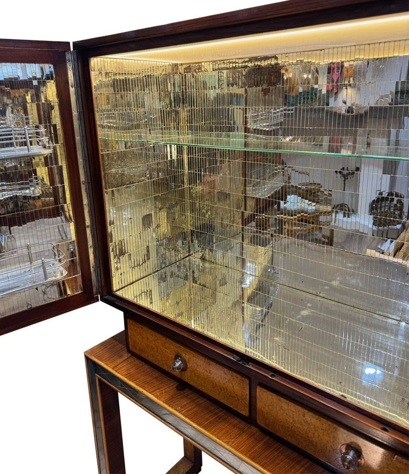 An Italian 1940s mirrored birdseye maple wood and mahogany bar cabinet by Osvaldo Borsani