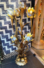 A wonderful 1960s Italian gilt metal flower lamp with seven lights in the flowers