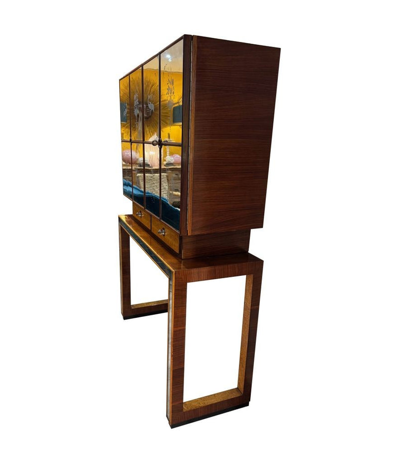 An Italian 1940s mirrored birdseye maple wood and mahogany bar cabinet by Osvaldo Borsani
