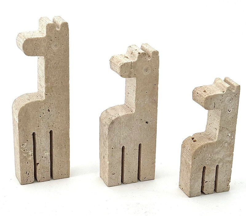 A set of three 1970s Fratelli Mannelli travertine giraffes