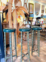 Four mid century faux bamboo bar stools with green seat pads - Spanish