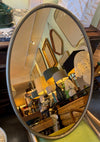 Mid Century Mirror Oval with brass frame and bronzed mirror plate Italian
