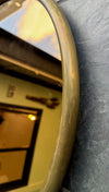 Mid Century Mirror Oval with brass frame and bronzed mirror plate Italian