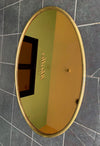 Mid Century Mirror Oval with brass frame and bronzed mirror plate Italian