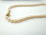 Vintage Akoya pearl necklace by Mappin & Webb 19carat gold in original box - 1980s