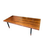 A very sleek Danish 1960s Rosewood coffee table with black metal frame and rosewood legs