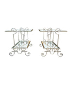 A pair of 1950s gilt wrought iron French side tables, with glass shelves