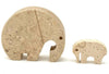 A pair of Italian 1970s carved travertine elephants by Fratelli Mannelli