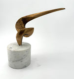 An Italian midcentury abstract 1960s bronze sculpture mounted on a circular Carrara marble base.