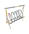 An unusual Italian 1950s mid century brass and black lacquered spiral magazine rack