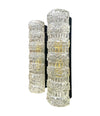 A pair of 1960s clear geometric textured glass wall lights
