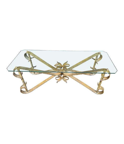 A Spanish 1950s gilt wrought iron coffee table with thick glass top